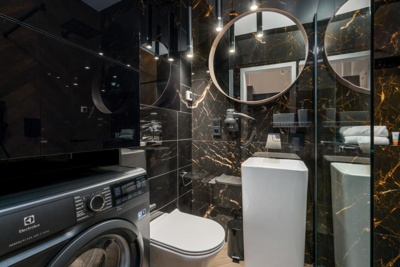 Central Apartments Garbary By Noclegi Renters بوزنان المظهر الخارجي الصورة